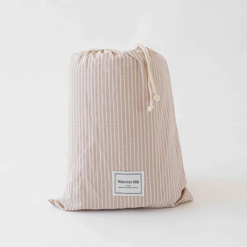 Matching striped drawstring dust bag for the Warren Hill Hamptons Stripe Play Mat