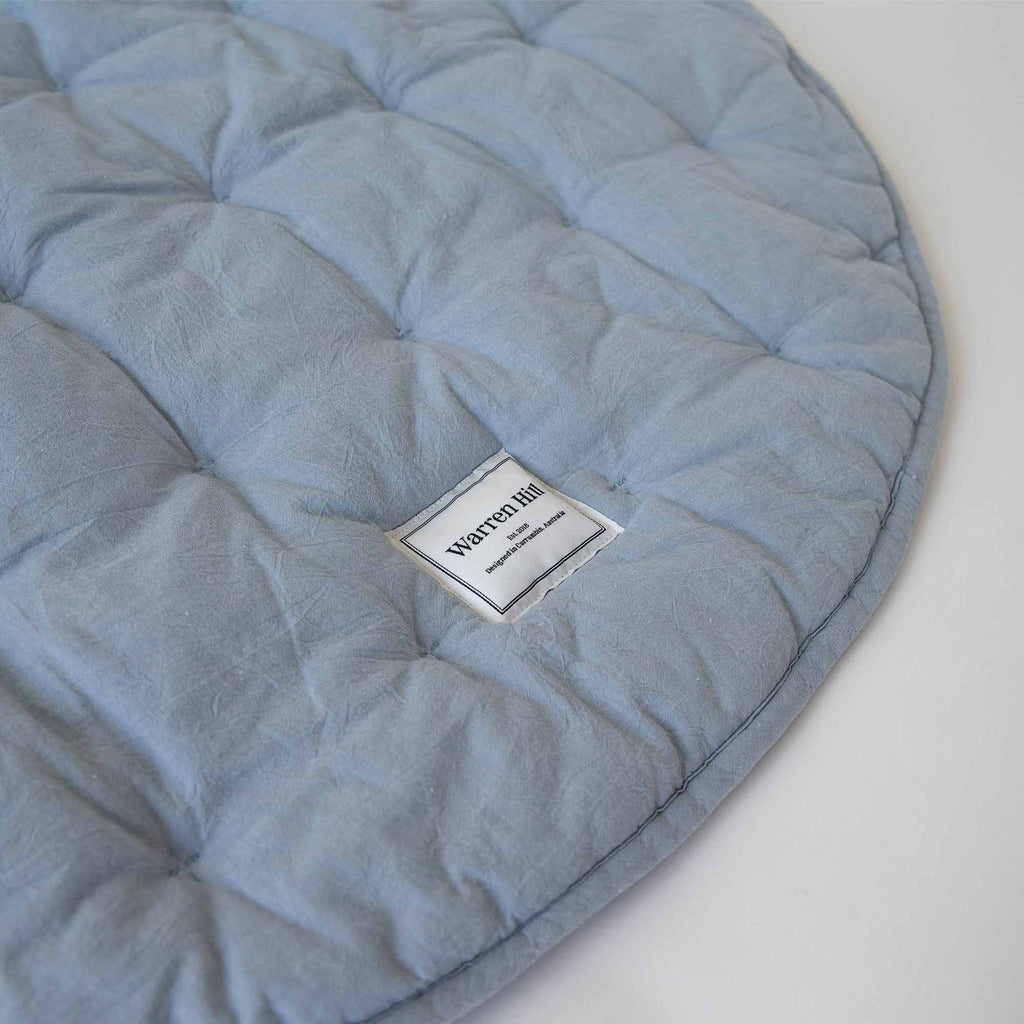 Soft, breathable cotton fabric with quilted stitching on the Sky Blue Quilted Play Mat