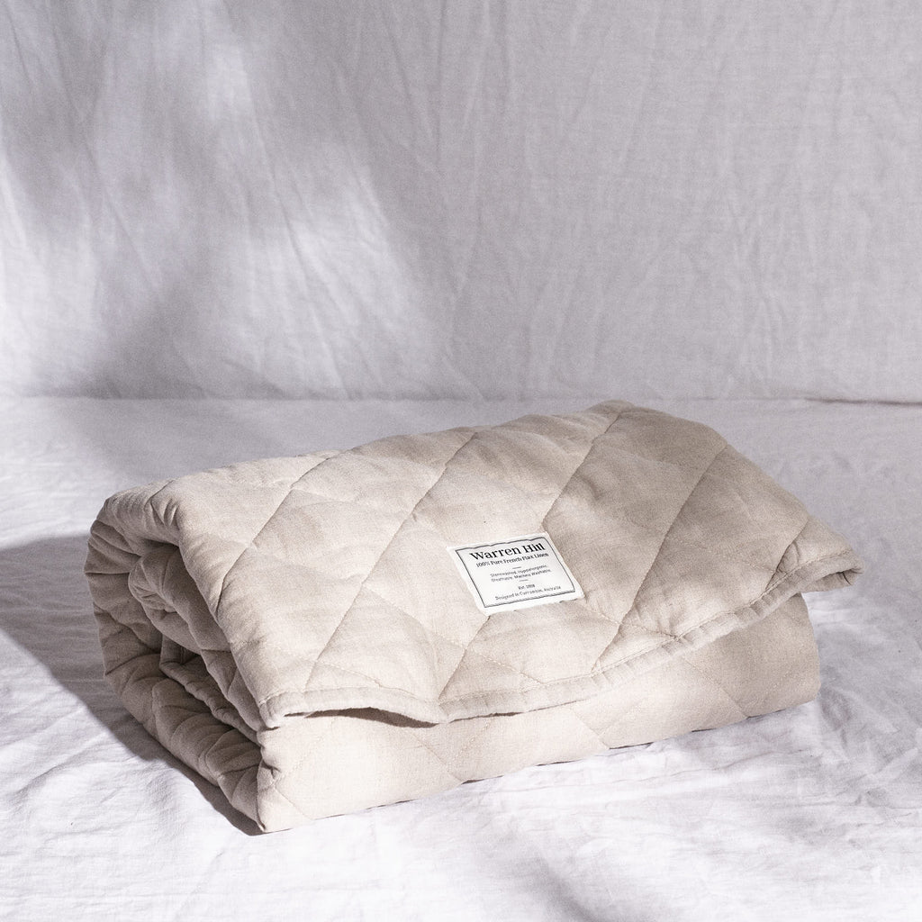 Warren Hill’s machine washable Natural Quilted Linen Play Mat