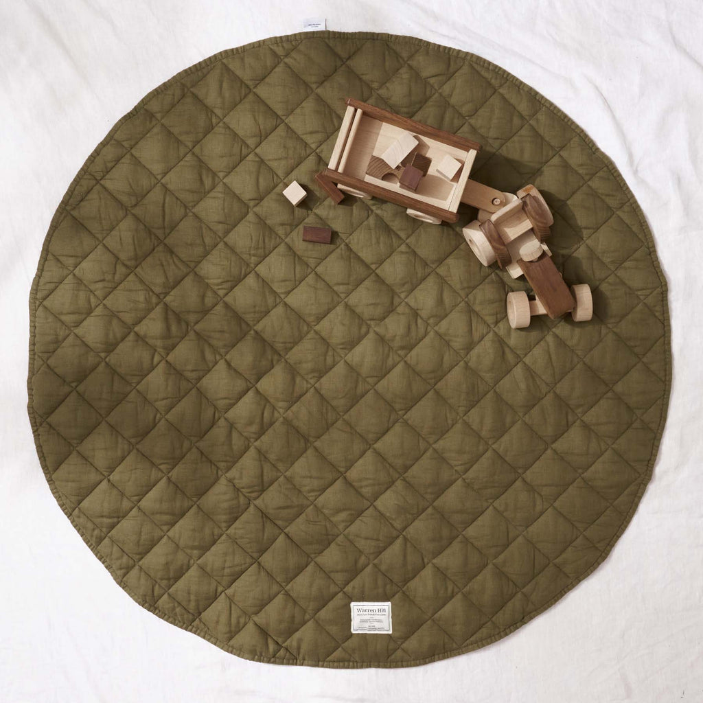 A stylish and practical play mat: Warren Hill Olive Quilted Linen Play Mat